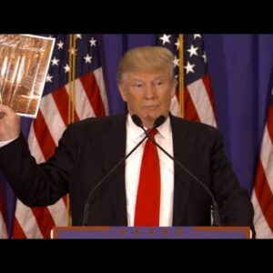Donald Trump Displays Off His Merchandise After Being Attacked By Mitt Romney
