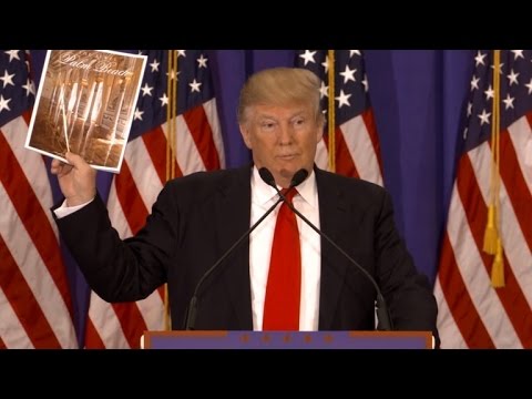 Donald Trump Displays Off His Merchandise After Being Attacked By Mitt Romney