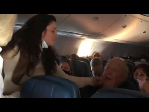 ‘Karen’ on Airplane Looks to Punch and Spit on Passenger